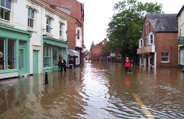 The floods looking down cross street